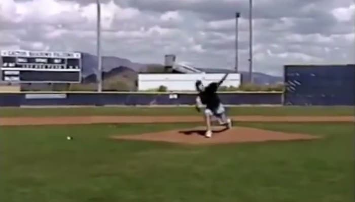 Isaac Hess throwing off a mound at Cactus Shadows High School in early 2006, seven months after his hip replacement