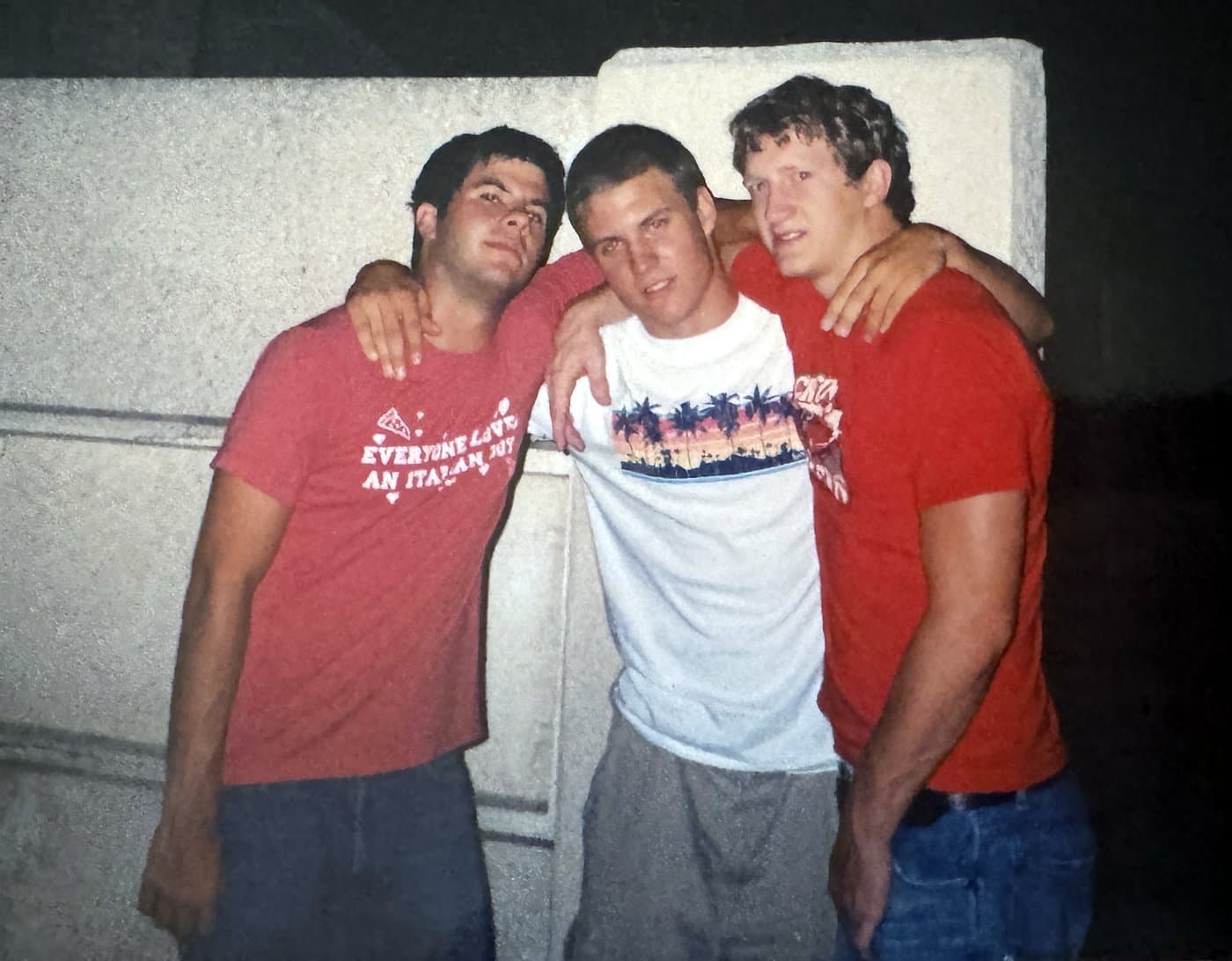 Isaac Hess, in the middle, with his arms around his best friends Chris and Eric